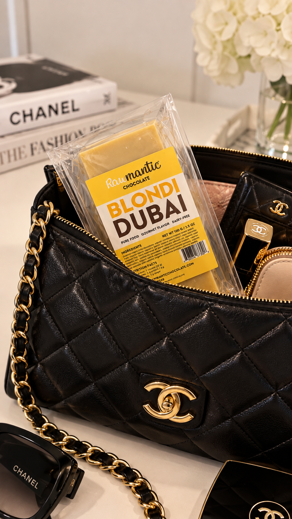 Blondi Dubai white chocolate bar in a black handbag